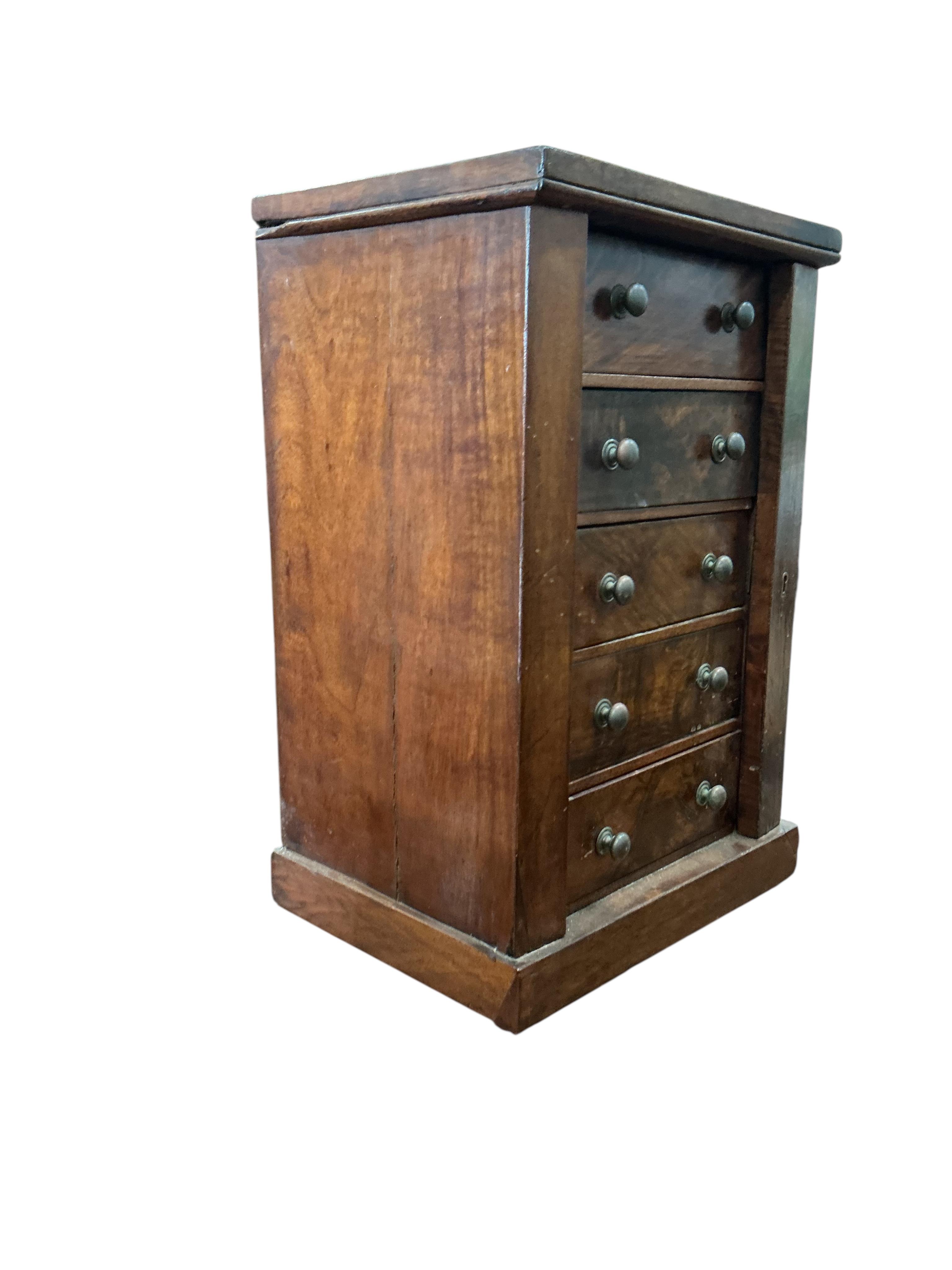 A Victorian walnut miniature wellington chest, width 35cm, depth 27cm, height 52cm
